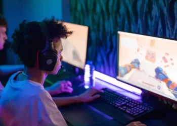 Gaming monitors in front of a person